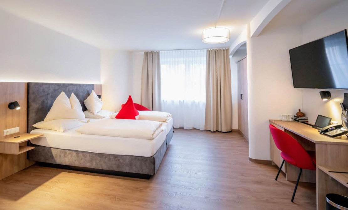 Doppelzimmer im Hotel Rosenvilla in Salzburg mit komfortablen Betten